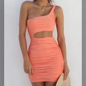 Orange one shoulder cut out dress